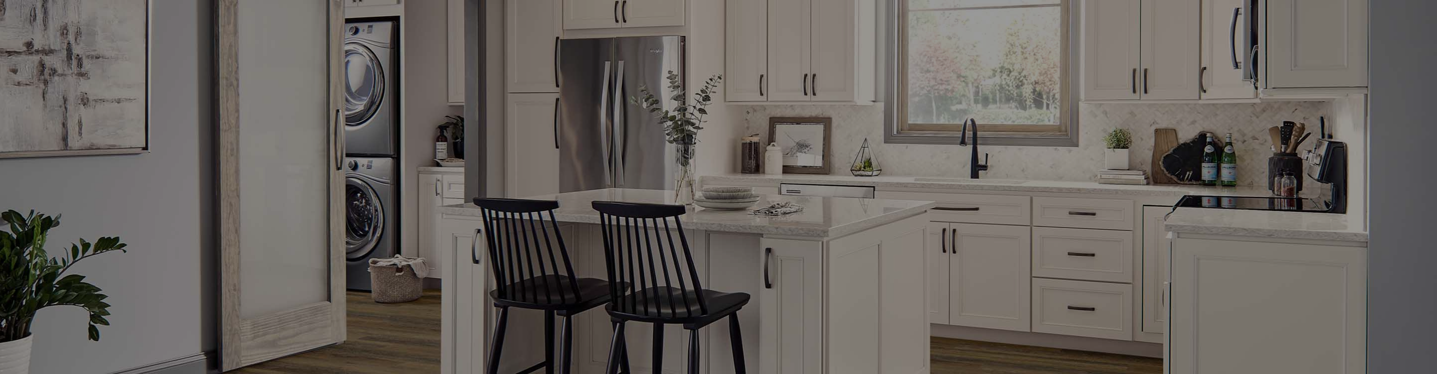 modern farmhouse kitchen with white cabinets and white countertops