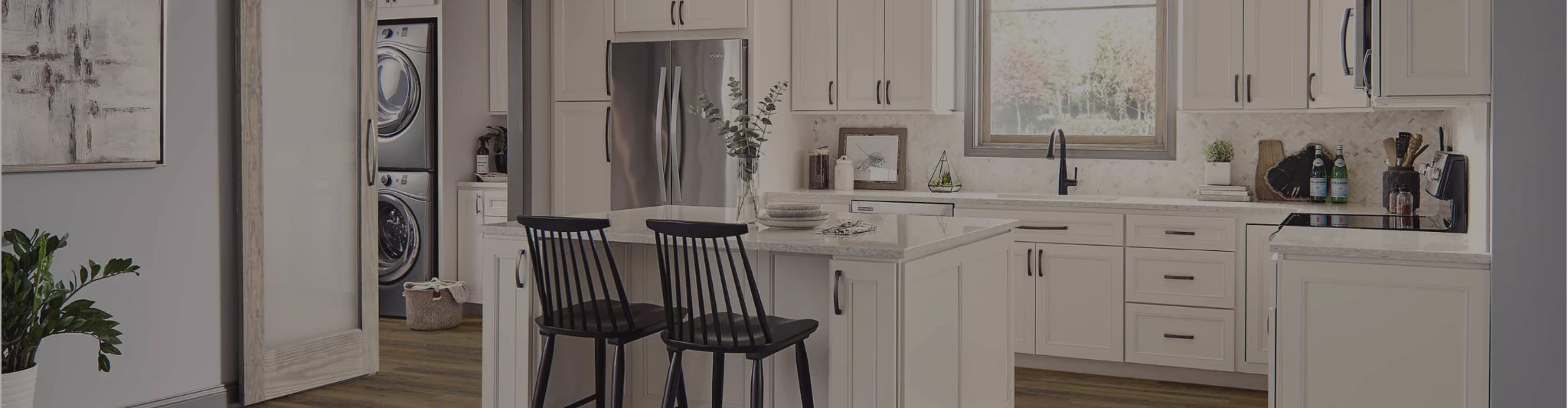 modern farmhouse kitchen with white cabinets and white countertops
